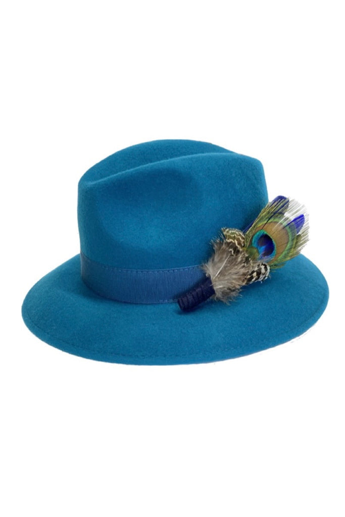 Teal blue fedora hat with peacock feather Cheltenham & winter style