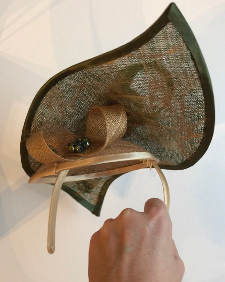 Green and gold hat for hire