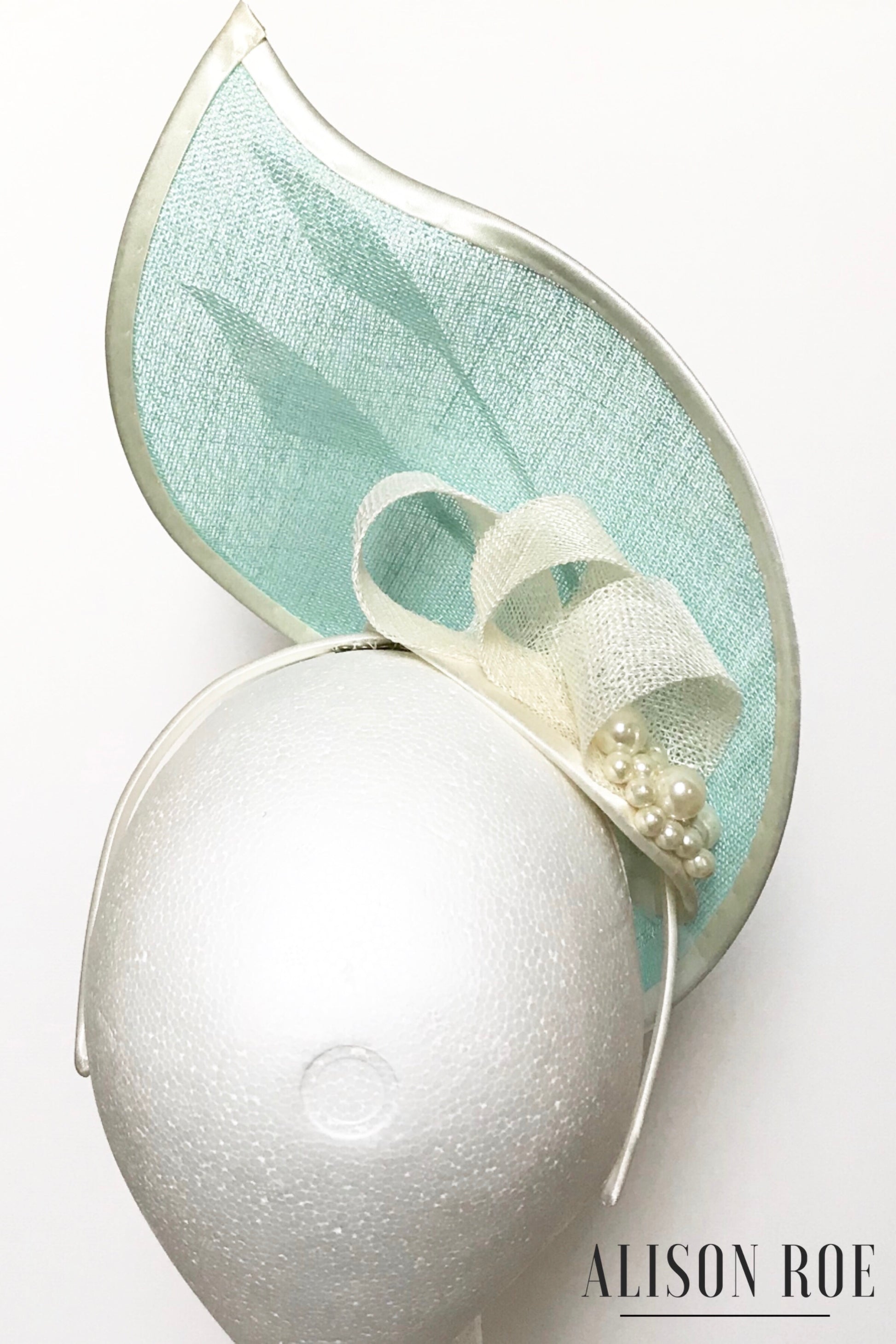 mint green headpiece to hire
