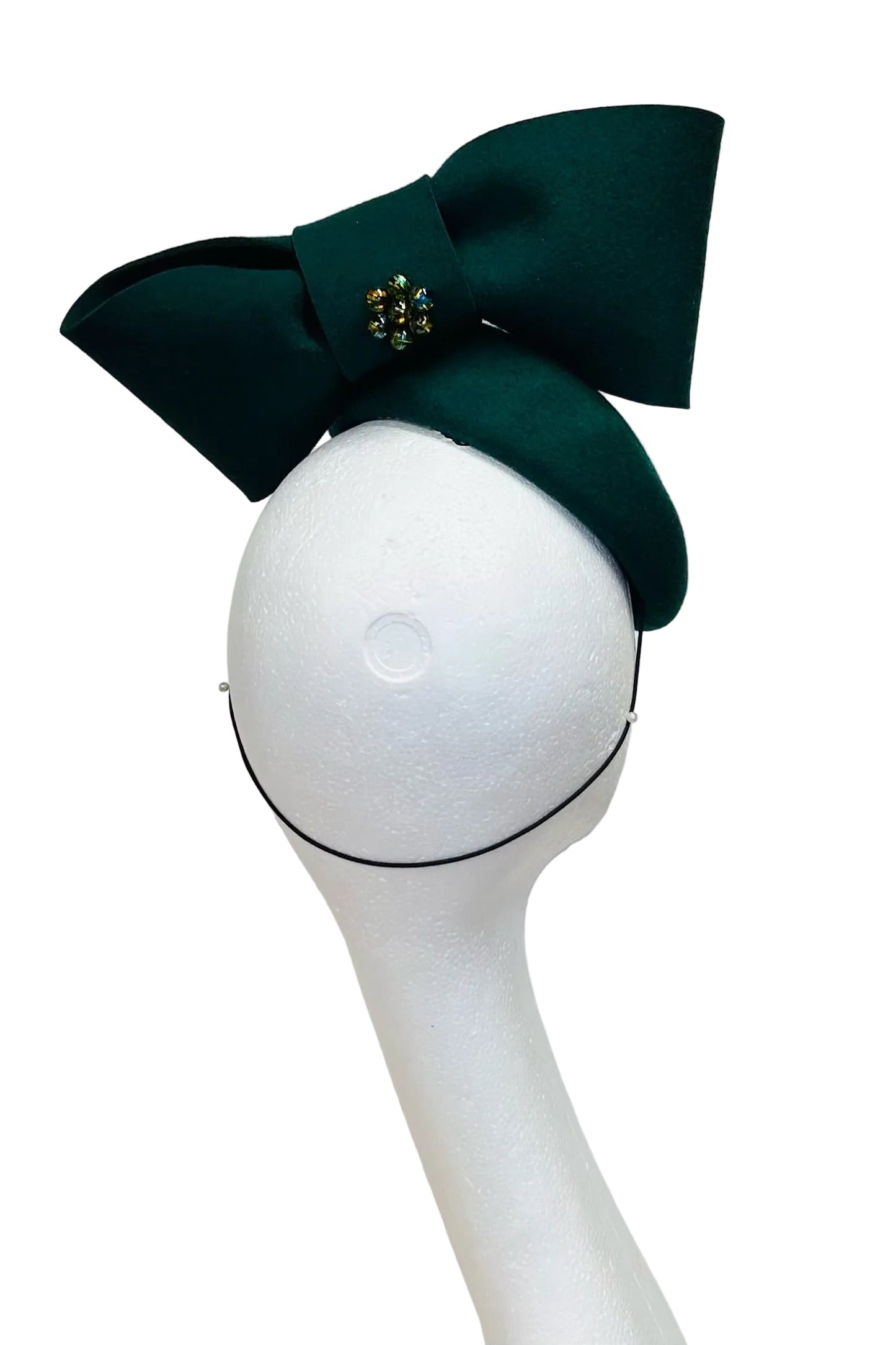 Green felt headpiece to hire