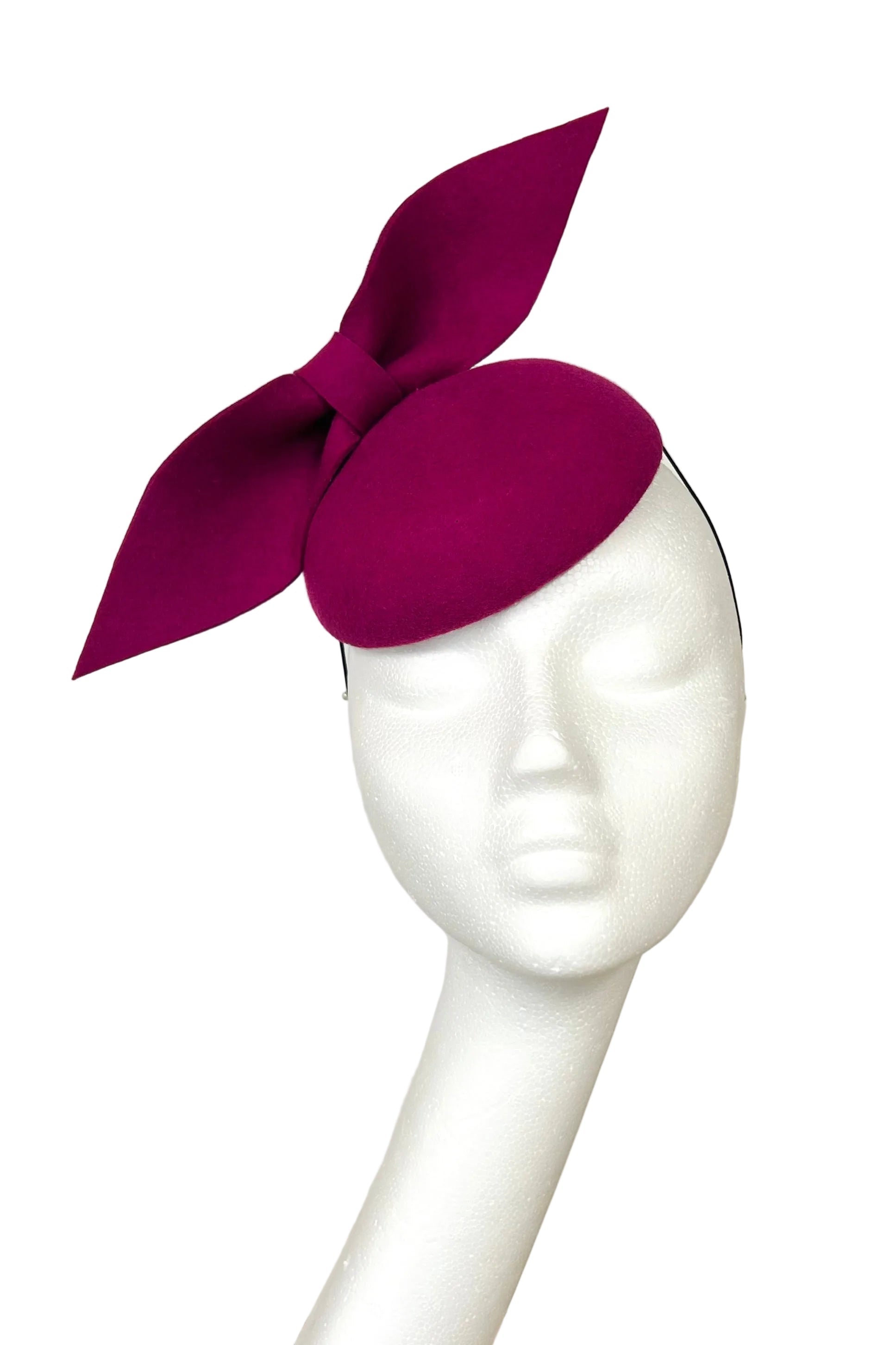 Raspberry pink headpiece for hire