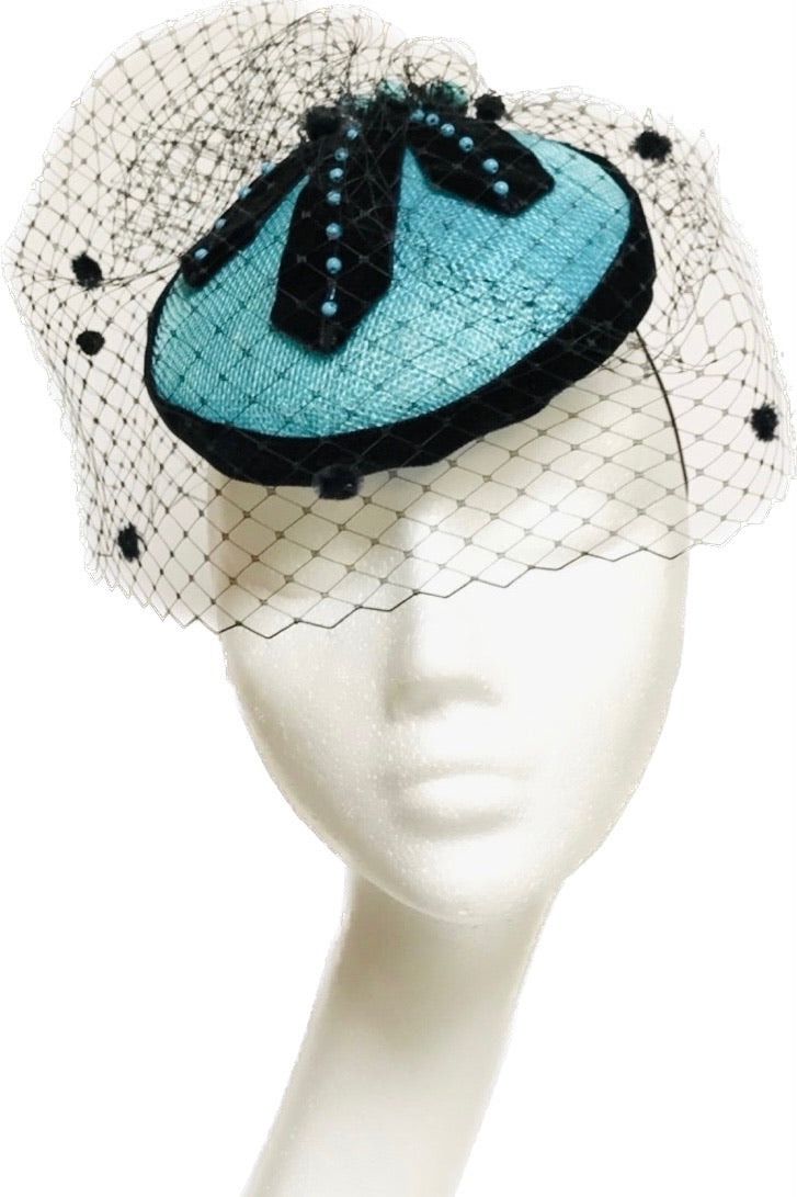 Turquoise headpiece to hire