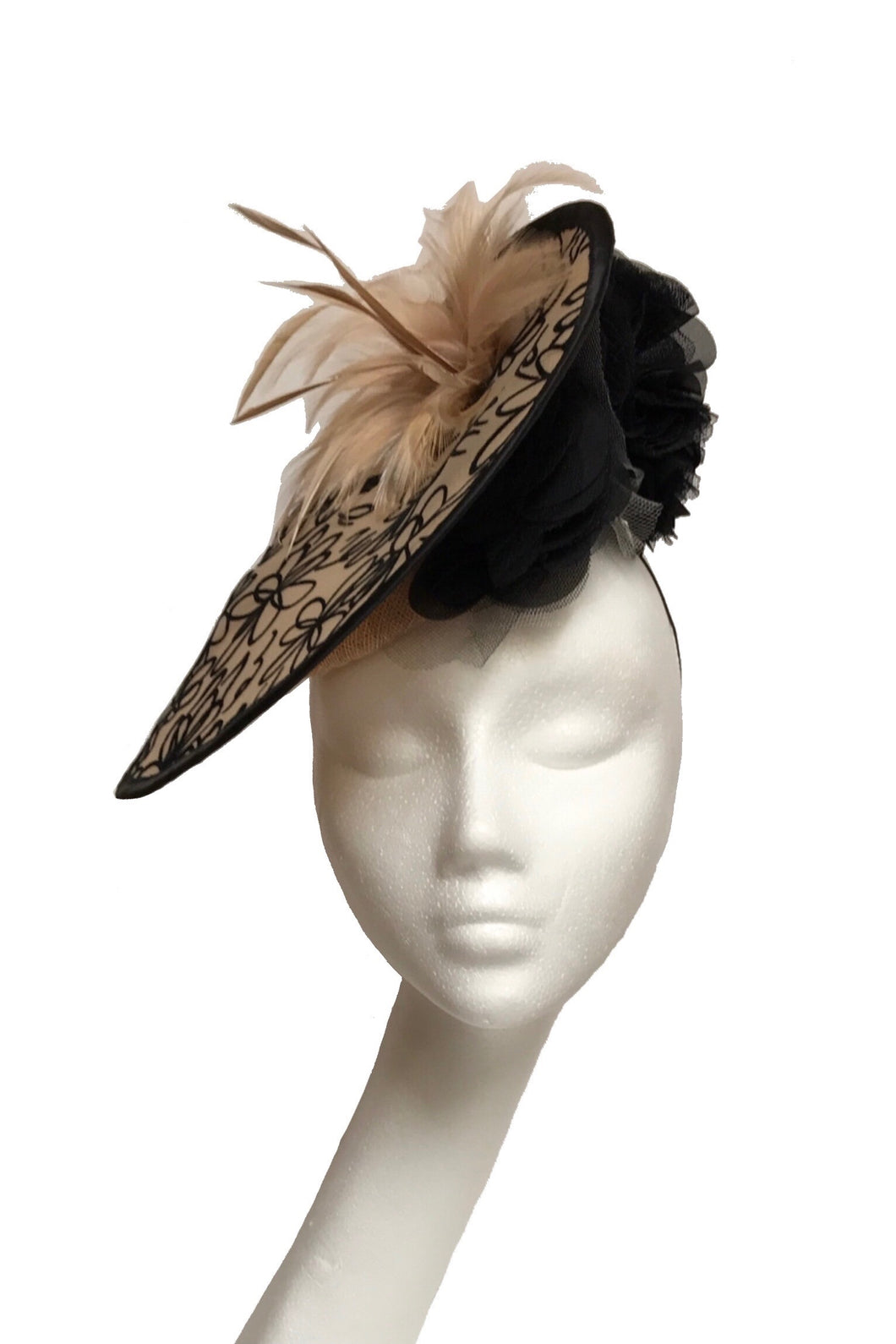 black and beige/nude headpiece to hire