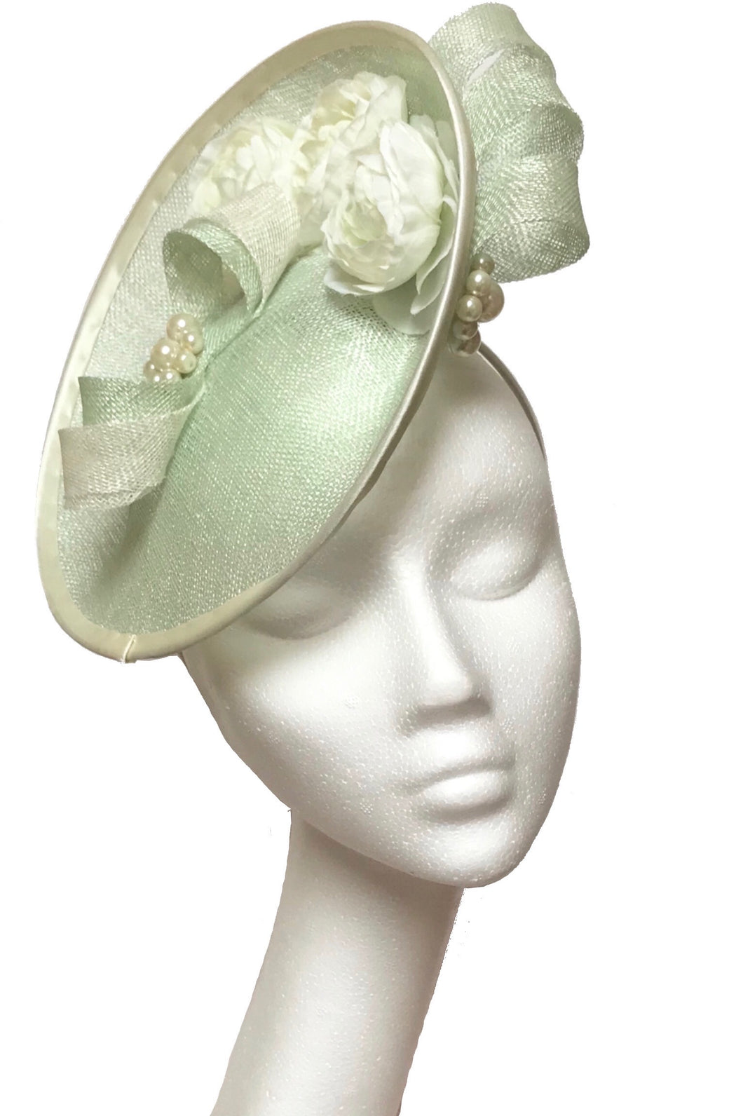 Pale green wedding hat to hire