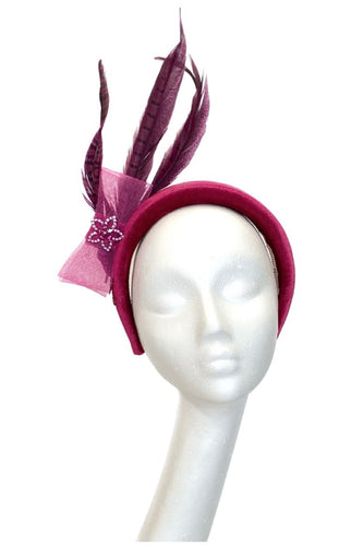 Deep pink velvet headband with pheasant feathers to hire