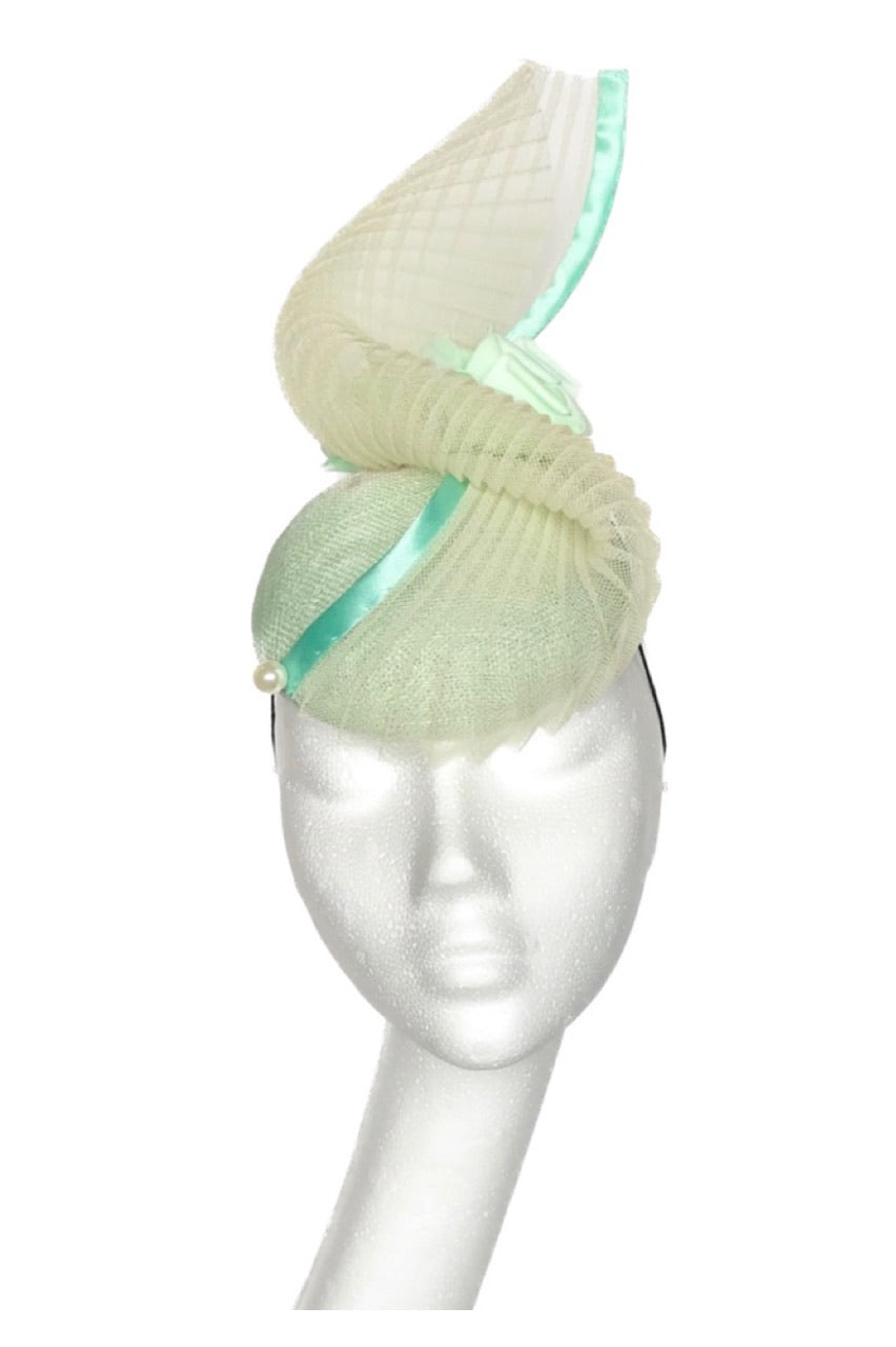 Pale green headpiece to hire