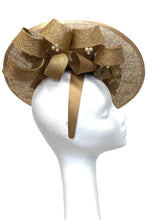 Gold designer headpiece for weddings and ladies day