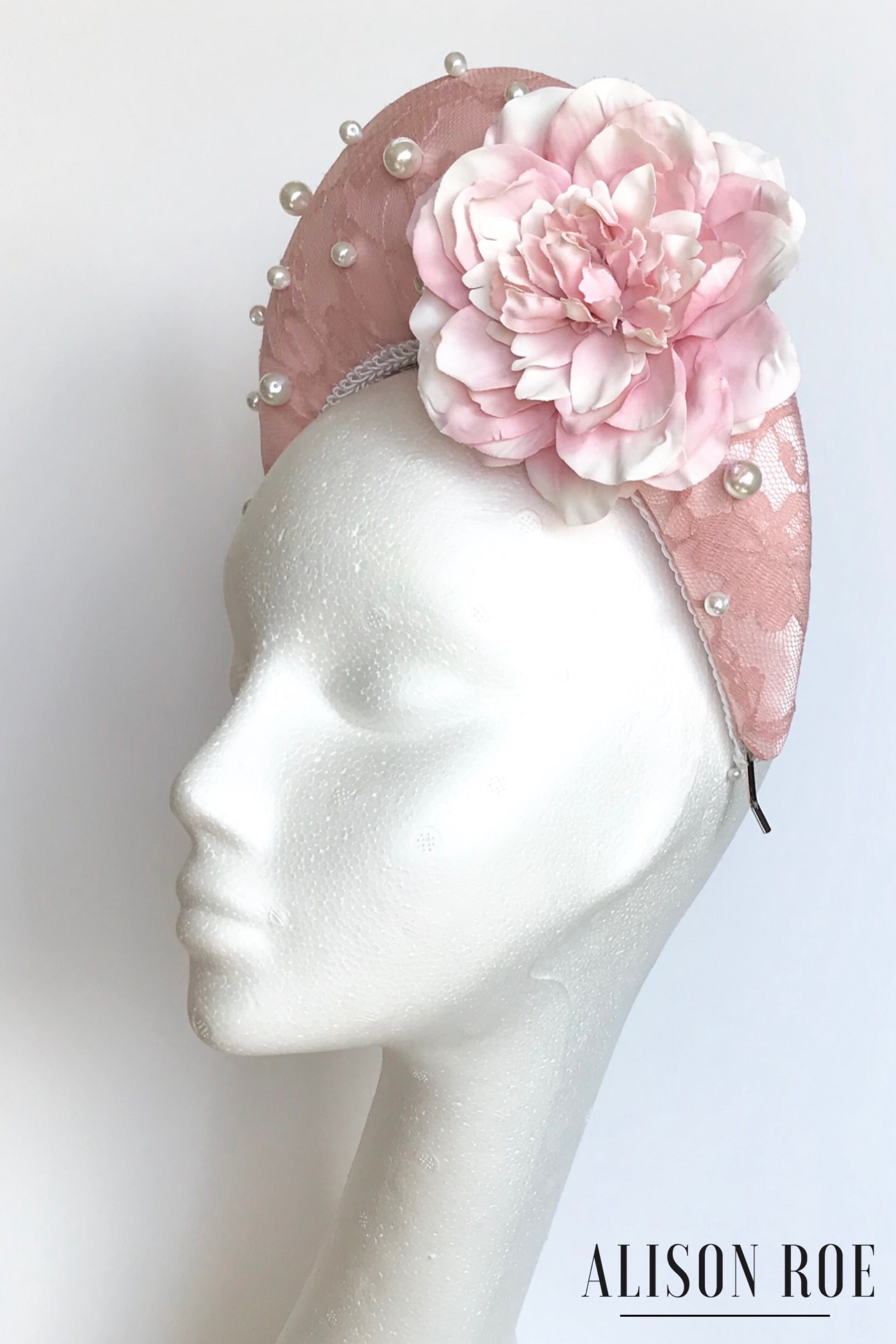Blush pink halo crown designer headpiece to hire