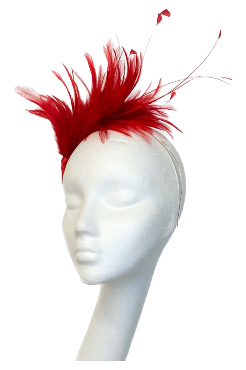 red fascinator to hire