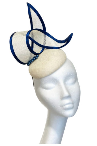 Ivory navy fascinator to hire