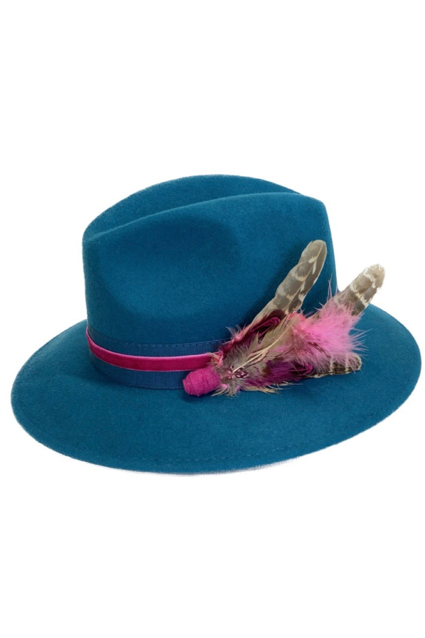 Teal blue fedora hat with pink feather hat pin