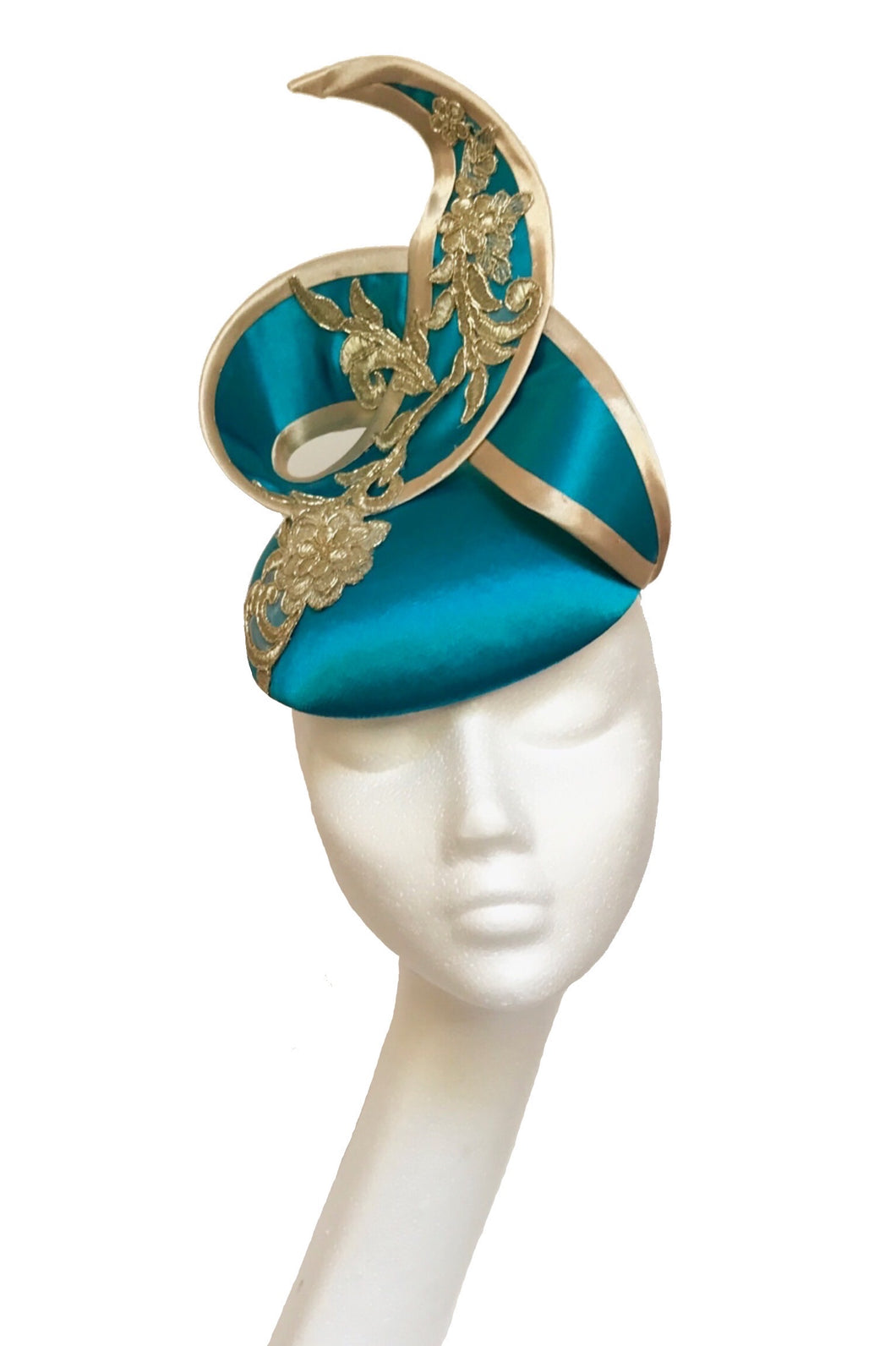Turquoise and gold wedding hat to hire