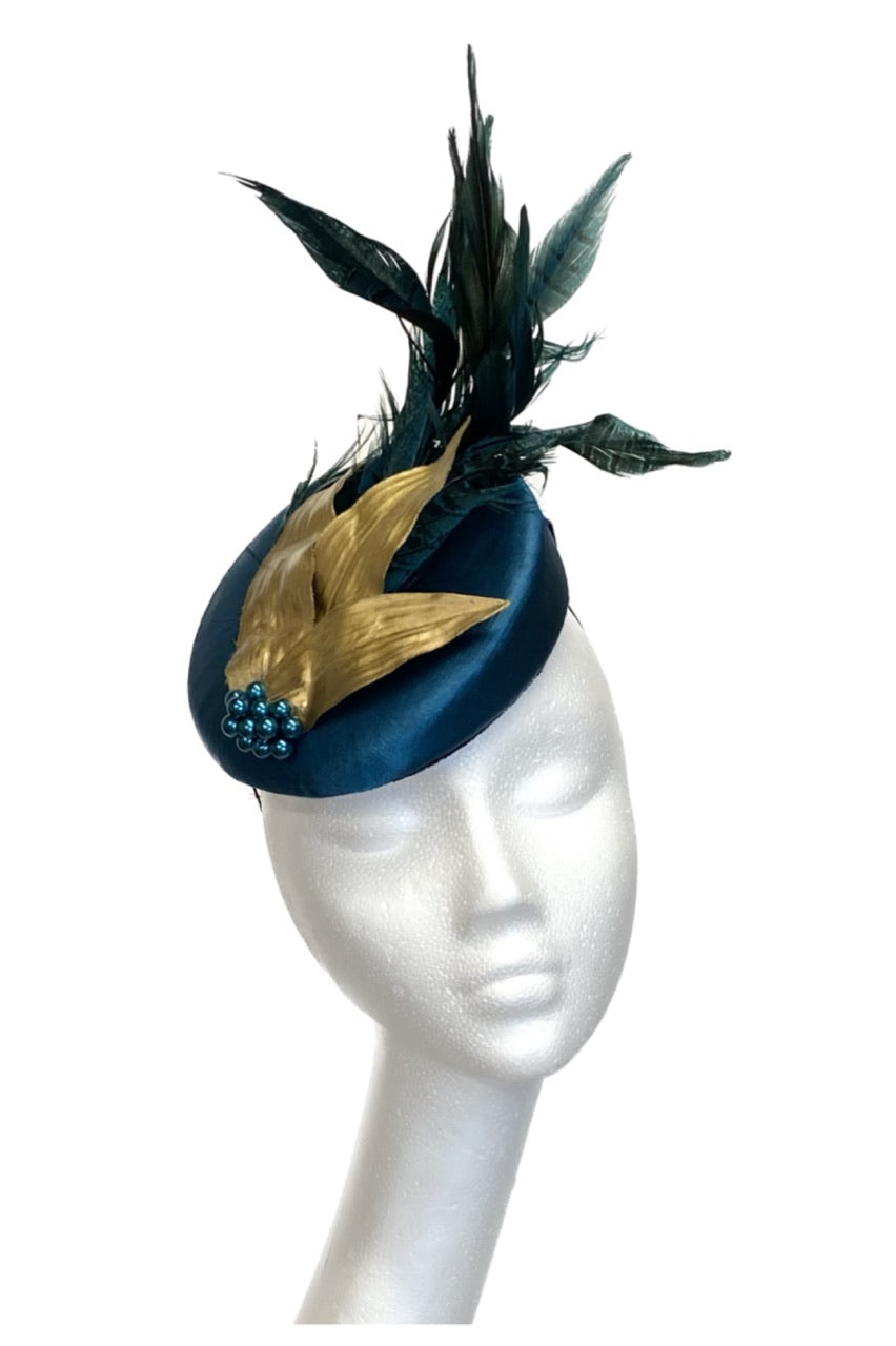 Teal green headpiece to hire